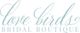 Elegant script logo says "Love Birds Bridal Boutique" in light blue.