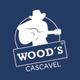 Logo da Wood's Cascavel com figura de cowboy tocando violão, fundo azul.