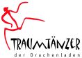 Logo mit roter tanzender Figur, Text: "Traumtänzer, der Drachenladen".