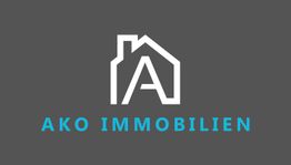 Logo von AKO Immobilien mit stilisiertem Haus und Buchstabe A auf grauem Hintergrund.