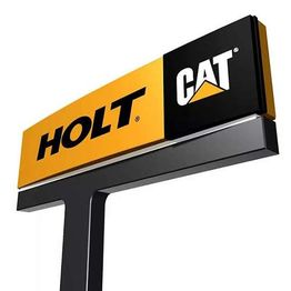 Sign with "HOLT" in yellow and "CAT" in black, featuring a construction machinery logo.