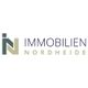 Logo von Immobilien Nordheide mit stilisiertem Buchstaben "IN".