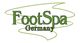 Logo mit grünem Text: "FootSpa Germany" vor einem geschwungenen grünen Hintergrund.