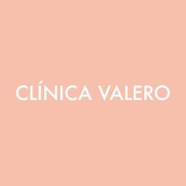 Texto "CLÍNICA VALERO" en fondo salmón claro.