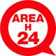 Cerchio rosso con testo al centro "AREA H 24" in bianco su sfondo rosso.
