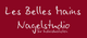 Bordeauxfarbener Hintergrund mit weißem Text: "Les Belles Mains Nagelstudio für Individualisten".