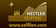 Logo von Nestler Seiffen mit Bäumen und Stern, Text: www.seiffen.com.