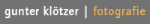 Text: "gunter klötzer | fotografie" in weiß und orange auf grauem Hintergrund.