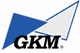 Logo mit Buchstaben "GKM" und blauen Dreiecken.
