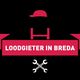 Logo met tekst "Loodgieter in Breda", met rode pet en gekruiste moersleutels onderaan.