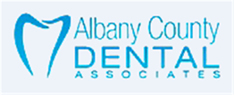 Logo of Albany County Dental Associates with a tooth graphic.