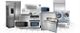 A variety of modern kitchen appliances, including a fridge, oven, microwave, and laundry machines.