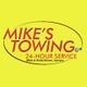 Yellow background with "Mike's Towing, 24-hour service" text in red.