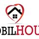 Logo di MobilHouse con una casa dentro un cuore rosso stilizzato.
