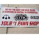 Pawn shop sign: "We pay the most for gold, silver & diamonds. Your #1 pawn shop."