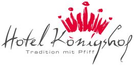 „Hotel Königshof“-Logo mit roter Krone, Slogan: „Tradition mit Pfiff“.