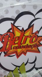 Texto colorido em fundo de quadrinhos com "Retrô Consolação" no centro de uma explosão gráfica.