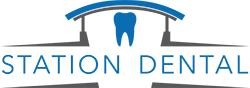 Station Dental logo with blue tooth graphic and arch design.