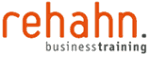 Logo mit der Aufschrift "rehahn. businesstraining" in orange und grau.