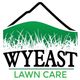 Logo of Wyeast Lawn Care with green grass and mountain silhouette.