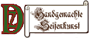 Buchstabe "D" und Schriftzug "Handgemachte Seifenkunst" auf einem gerollten Papier.