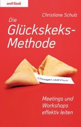 Rotes Buchcover mit Glückskeksen: "Die Glückskeks-Methode" von Christiane Schulz.