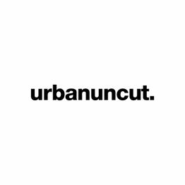 Schwarzer Text "urbanuncut" auf weißem Hintergrund.