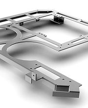 Metallrahmen mit rechteckigen und runden Aussparungen auf weißem Hintergrund.