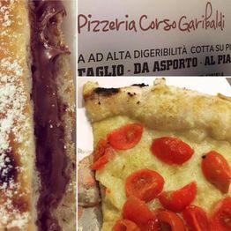 Trancio di pizza con pomodorini e nutella in pizzeria; insegna "Pizzeria Corso Garibaldi".