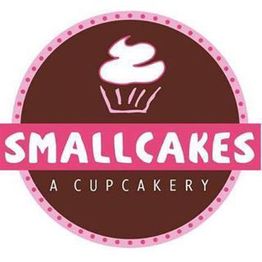 Brown and pink logo of Smallcakes, A Cupcakery, featuring a cupcake icon.