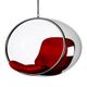 Hanging bubble chair with a red cushion inside a transparent sphere.