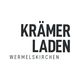 Schwarzer Text "KRÄMER LADEN" und "WERMELSKIRCHEN" auf weißem Hintergrund.