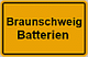 Gelbes Schild mit schwarzem Rahmen, Aufschrift: "Braunschweig Batterien".