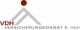 Logo von VDH Versicherungsdienst K. Höll, mit stilisiertem Dach und Punkt in Rot und Grau.