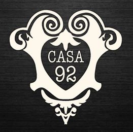 Desenho decorativo com a inscrição "Casa 92" em um fundo preto.