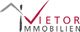 Logo von Vietor Immobilien mit stilisiertem Hausdach und rotem Häkchen.