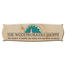 Logo of The Woodworkers Shoppe with a saw blade and tree design on wood-textured background.