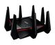 Black, angular Wi-Fi router with multiple antennas and a sleek, modern design.