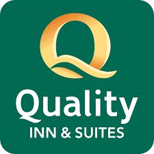 Quality Inn & Suites logo with a gold "Q" on a green background.