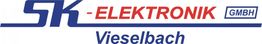 Logo der SK-Elektronik GmbH Vieselbach in Blau und Rot mit weißem Hintergrund.