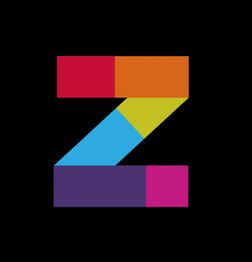 De letter Z in diverse kleuren op een zwarte achtergrond.