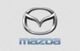 Mazda logo with a stylized silver "M" emblem above the brand name in blue letters.