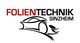 Logo von Folientechnik Sinzheim mit stilisiertem Auto in Schwarz und Rot.