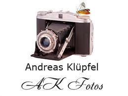 Alte Kamera mit Schmetterling, Text: Andreas Klüpfel, AK Fotos.