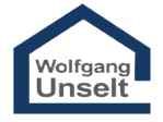 Logo mit einem blauen Hausumriss und dem Text "Wolfgang Unselt".