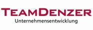 Logo von TeamDenzer mit dem Schriftzug „Unternehmensentwicklung“ darunter, in Rot und Schwarz.