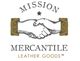 Logo of Mission Mercantile Leather Goods featuring a handshake and decorative elements.