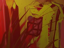 Bunte T-Shirts mit grafischen Mustern, rot-gelbes Licht und Pflanze im Vordergrund.