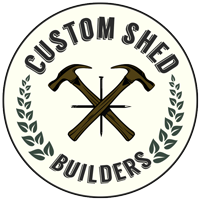 Logo of Custom Shed Builders with crossed hammers and laurel leaves.