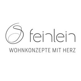 Feinlein-Logo: "Feinlein - Wohnkonzepte mit Herz" in elegantem Schriftzug mit stilisiertem Symbol.